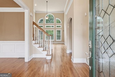 You will love this 6-bedroom home with the primary suite on the - photo 7