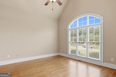 You will love this 6-bedroom home with the primary suite on the - photo 8