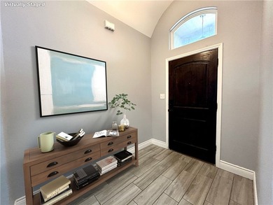 Nestled back in a private, gated community, this well taken care - photo 3