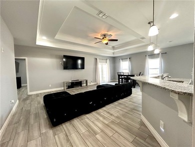 Nestled back in a private, gated community, this well taken care - photo 4