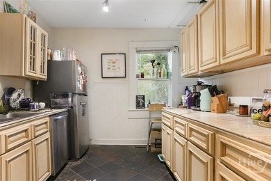 HAVE YOU BEEN LOOKING FOR A DUPLEX WHERE YOU CAN LIVE IN ONE - photo 25