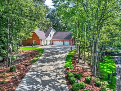 Nestled on a wooded golf course lot in the sought-after - photo 6