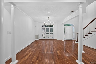 Nestled on a wooded golf course lot in the sought-after - photo 9