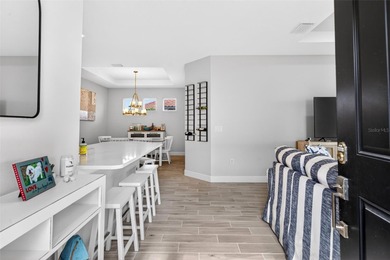 Experience effortless Florida living at 3021 Veneto Ct, a GOLF