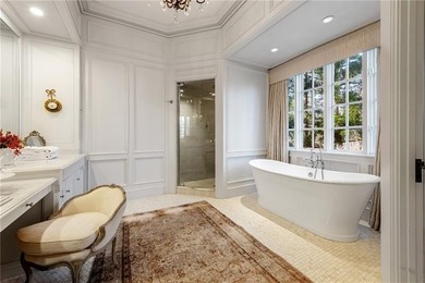 This home is truly magnificent! With its soaring ceilings and - photo 30