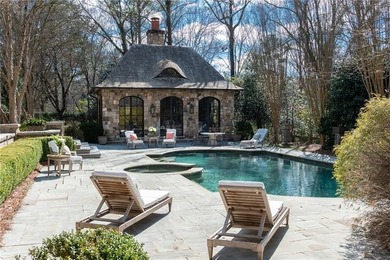 This home is truly magnificent! With its soaring ceilings and - photo 50