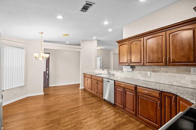 Welcome home to this lakefront Pelican model in the Savanna Club - photo 11