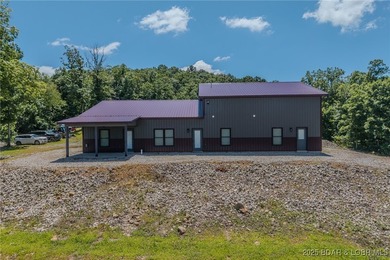 Spacious 1.20 acres and 80' of lakefront in a reg no wake cove - photo 2