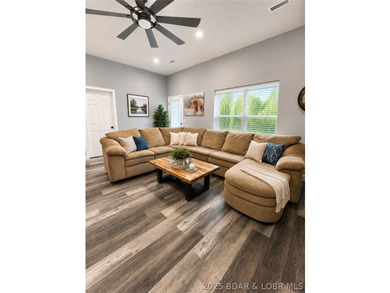 Spacious 1.20 acres and 80' of lakefront in a reg no wake cove - photo 6
