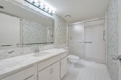 Rarely available 3BR/2.5BA corner unit offering direct - photo 26