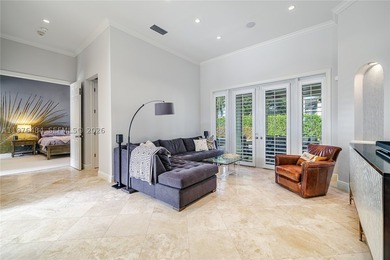 Beautifully updated 4BD/3BA + office residence in the gated - photo 6