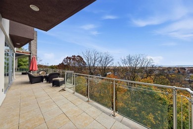 Welcome to 186 Flagg Place, a rare modern masterpiece perched - photo 15