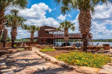 Set on two expansive open-water lots with 170 feet of prime Lake - photo 11