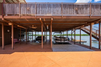 Set on two expansive open-water lots with 170 feet of prime Lake - photo 12