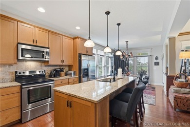 Located in a highly sought-after gated, golf cart-friendly - photo 13
