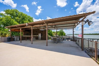 Set on two expansive open-water lots with 170 feet of prime Lake - photo 14