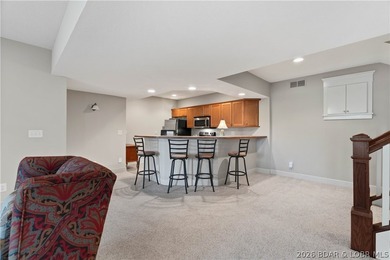 Located in a highly sought-after gated, golf cart-friendly - photo 35