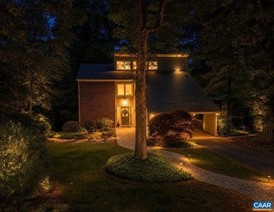 Tucked along the shores of Lake Monticello, is this Custom - photo 3