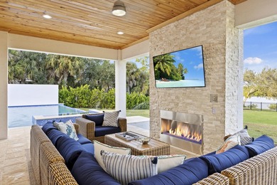 This architectural showpiece of coastal waterfront living - photo 12