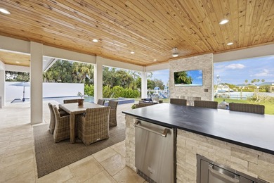This architectural showpiece of coastal waterfront living - photo 13