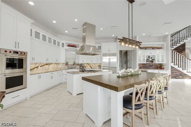 Step into waterfront grandeur at this custom-built Gulf access - photo 14
