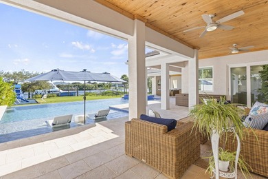 This architectural showpiece of coastal waterfront living - photo 14