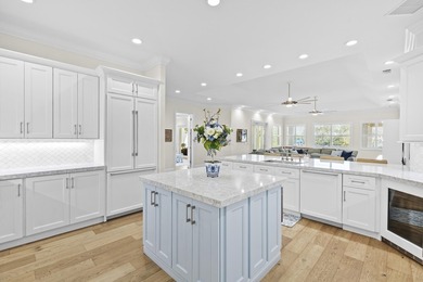 This architectural showpiece of coastal waterfront living - photo 18