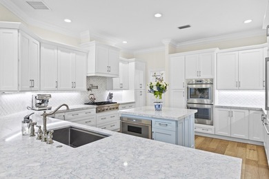 This architectural showpiece of coastal waterfront living - photo 19
