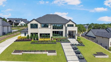 Luxury custom home in Heath, TX with soaring ceilings, walls of - photo 1