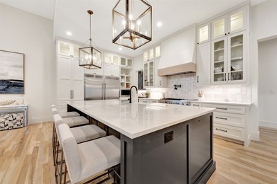 Luxury custom home in Heath, TX with soaring ceilings, walls of - photo 3