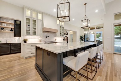 Luxury custom home in Heath, TX with soaring ceilings, walls of - photo 5