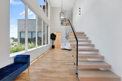 Luxury custom home in Heath, TX with soaring ceilings, walls of - photo 9