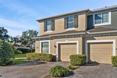 Located within the gated Riverview Townhomes community, this - photo 2
