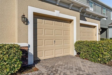 Located within the gated Riverview Townhomes community, this - photo 5