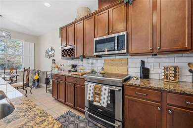 Located within the gated Riverview Townhomes community, this - photo 6
