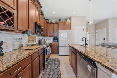 Located within the gated Riverview Townhomes community, this - photo 7