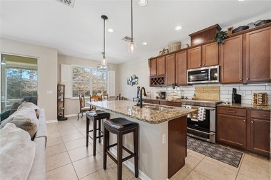 Located within the gated Riverview Townhomes community, this - photo 8