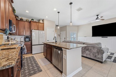 Located within the gated Riverview Townhomes community, this - photo 9