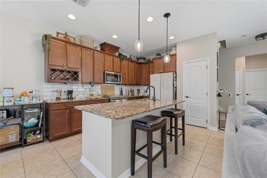 Located within the gated Riverview Townhomes community, this - photo 10