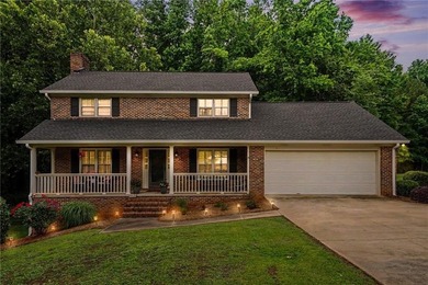 Welcome to this charming traditional home nestled on a spacious - photo 1