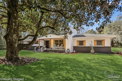 NEW PRICE REDUCTION! Tucked away on five private acres, this - photo 1