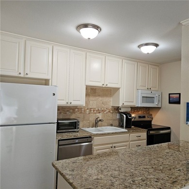 WATERFRONT CONDO - FURNISHED 1 BEDROOM GROUND FLOOR UNIT - photo 4