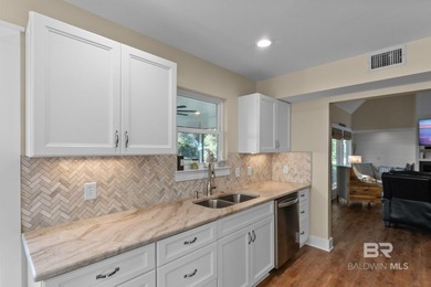 Designed for comfortable waterfront living, this recently - photo 17