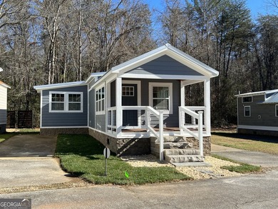 This custom *magnolia* titled Park Model RV brings tiny living - photo 2
