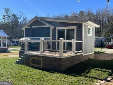 This custom *magnolia* titled Park Model RV brings tiny living - photo 3