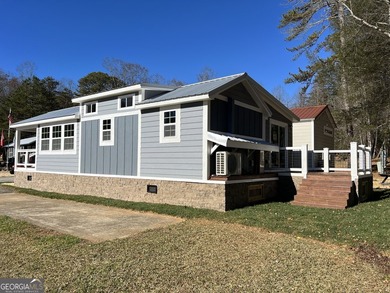 This custom *magnolia* titled Park Model RV brings tiny living - photo 4
