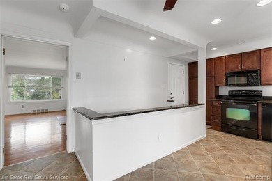 Welcome home to this updated, canal-front, brick ranch, with - photo 21