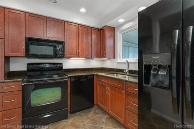 Welcome home to this updated, canal-front, brick ranch, with - photo 22