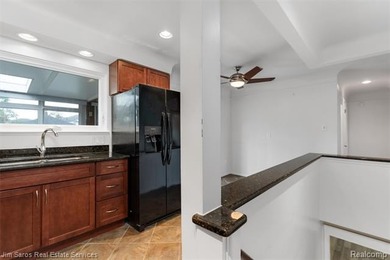 Welcome home to this updated, canal-front, brick ranch, with - photo 23