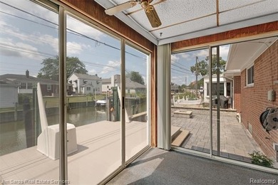 Welcome home to this updated, canal-front, brick ranch, with - photo 38